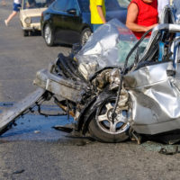 Remains of a fatal car crash and terribly damaged car Remains of a fatal car crash and terribly damaged car