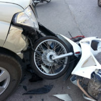 Accident between pickup truck and motorcycle