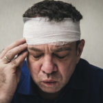 Man with a concussion.jpg.crdownload Man with a concussion.jpg.crdownload