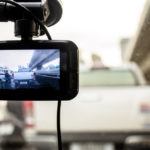 The image of camera on dashboard of car The image of camera on dashboard of car