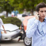 Teenage Driver Making Phone Call After Car Accident Teenage Driver Making Phone Call After Car Accident