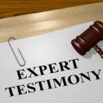 Expert testimony case form with gavel on top Expert testimony case form with gavel on top