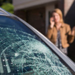 Woman calling For Help After finding broken car windshield Woman calling For Help After finding broken car windshield