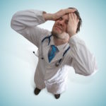 stressed doctor after making medical mistake stressed doctor after making medical mistake