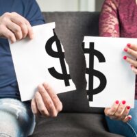 Fight about money or financial argument concept. Man and woman h Fight about money or financial argument concept. Man and woman h