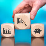 Wooden blocks with symbol of bankruptcy concept on blue background